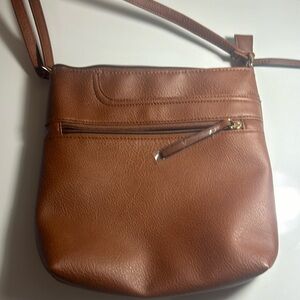 Never used ! No tags included.  Wonderful bag  10.25" length, 10.5" height,